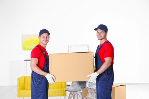 Removal van and moving team prepared for a house move in Noak Hill