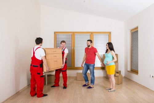 Careful loading of household furniture during a Noak Hill home removal