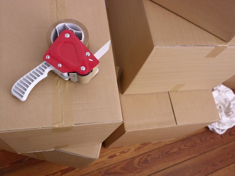 House removalists loading boxes and furniture for a move in Noak Hill