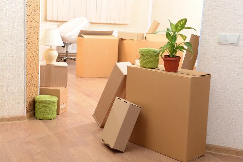 Boxes and furniture prepared for collection by a local van service