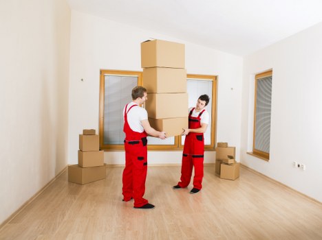 Professional moving van loading boxes and furniture for a Noak Hill move